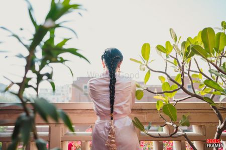 long braided hairstyle with paranda for punjabi/sikh brides