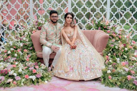 mehendi couple portrait with all pastel decor and outfits