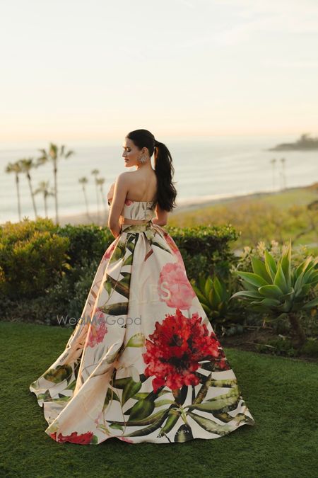 Photo of Gorgeous floral gown with strapless detailing and flared train