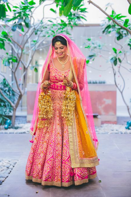 bright pink bridal lehenga by Shyam Narayan Prasad