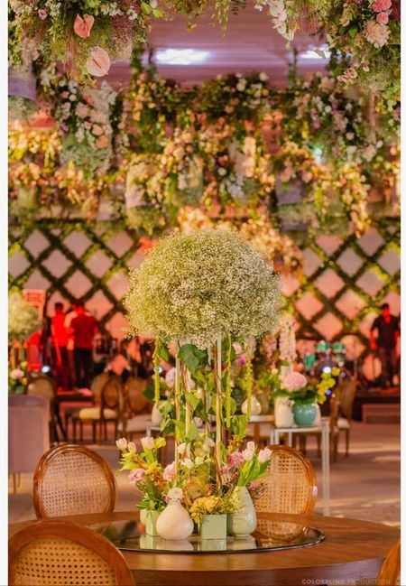 Photo of babys breath tall floral centrepiece idea for table setting