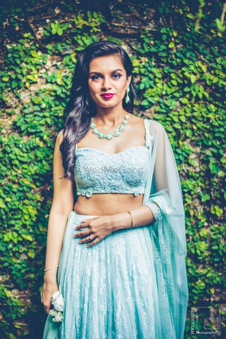Photo of Light blue engagement lehenga with bustier blouse