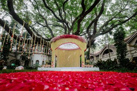 Photo of A beautiful mandap decorated with mogras and roses.