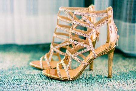 Photo of Gold bridal heels with straps