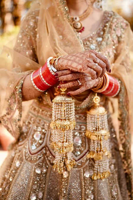 Photo of Bride Wearing Golden Kaleerein