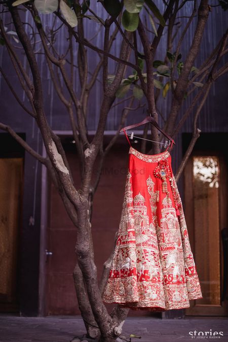 Bridal lehenga with unique embroidery on hanger 