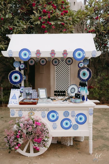 This unique evil eye favor station for the mehendi event
