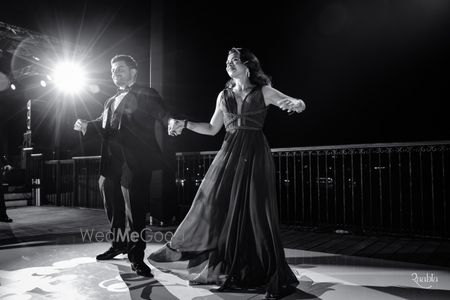 Photo of Cute capture of the bride and groom in black and white as they dance on their sangeet night