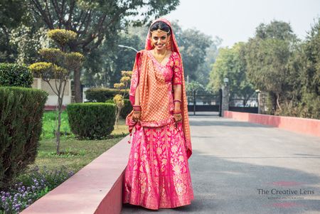 Photo of Pink and orange bridal lehenga by Ekaya
