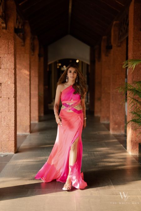 Photo of Stunning ombre pink gown with cut out detailing and one shoulder neckline.