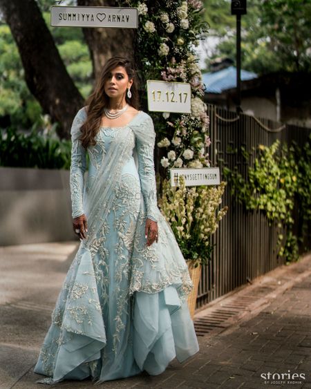 Photo of Offbeat wedding outfit light blue gown