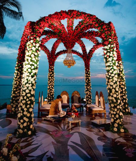 Super pretty floral mandap for a beach wedding