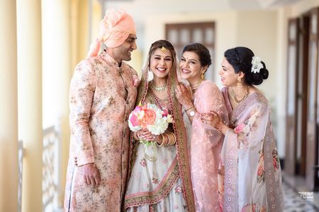 The bride and her family in coordinated floral outfits