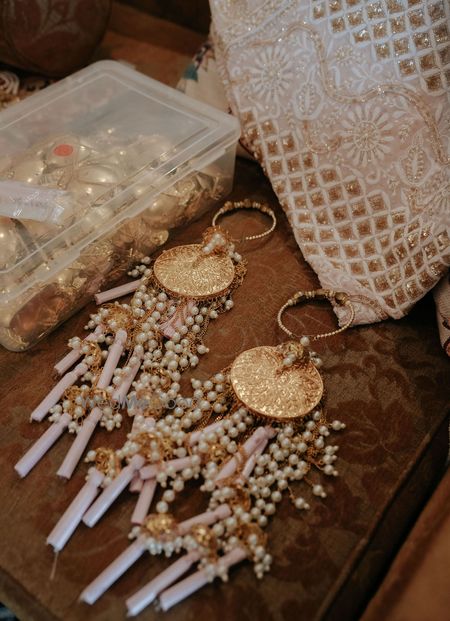 Photo of Gorgeous kaleeras in pearl and gold for the bride