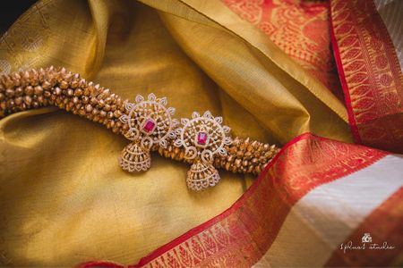 Photo of South Indian bridal jewellery with diamond earrings
