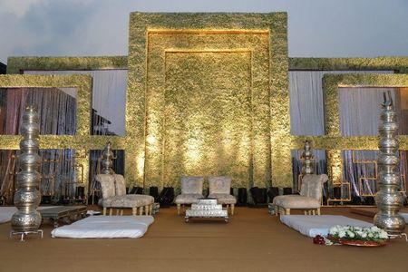 Stage decor in white with floral wall