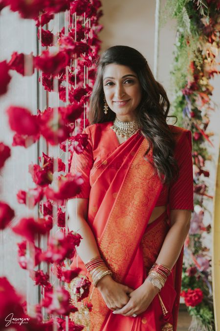 Bride in a red silk saree for an intimate wedding 
