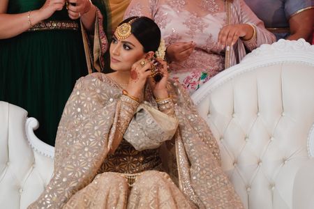 Bridal portrait on engagement in all gold outfit 