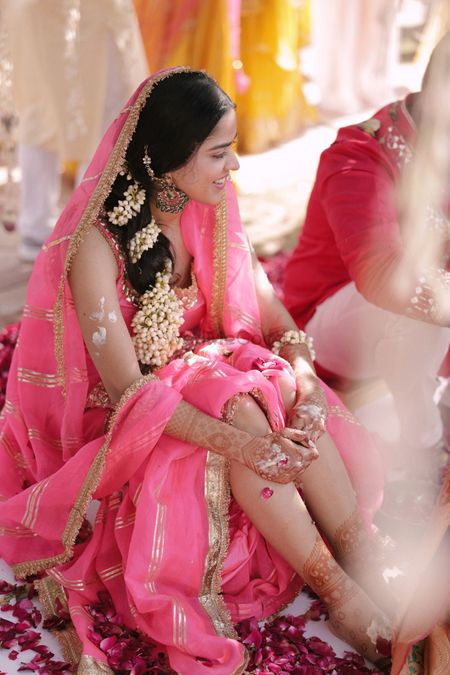 Bride in a pink outfit for the Haldi 