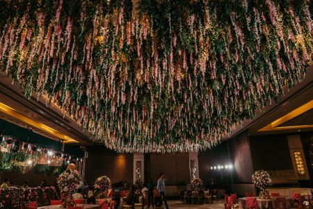 Grand engagement decor idea with floral ceiling 
