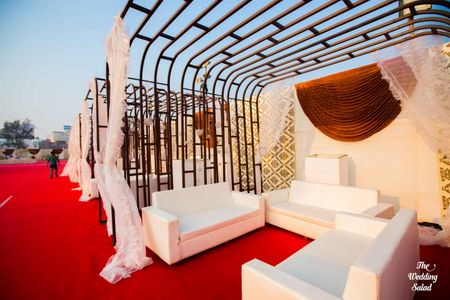 Photo of white lounges for the wedding
