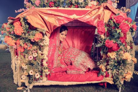 Photo of Bride entering in floral palki