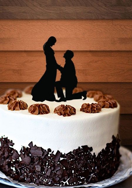 Photo of Cake with proposal topper