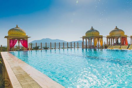 Poolside Venue with Gold and Pink Mandap Decor