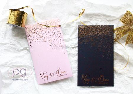Photo of Light Pink and Black Wedding Cards with Sparkle Dust