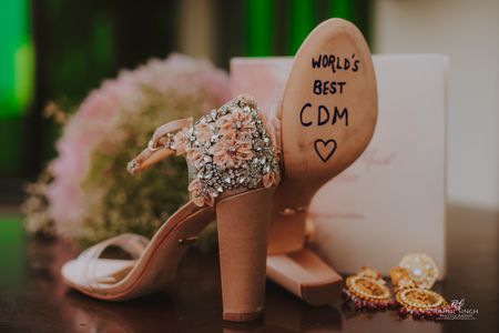 Photo of Embellished bridal footwear.