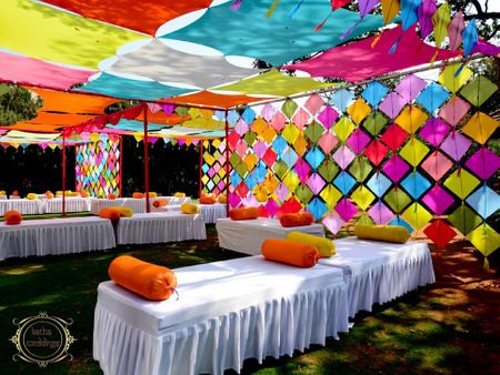A fun and colorful mehendi decor idea with kites