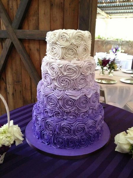Photo of 4 tier lavender and white ombre wedding cake
