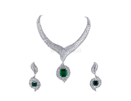 Jewels by Preeti. emerald and diamond necklace set with earrings