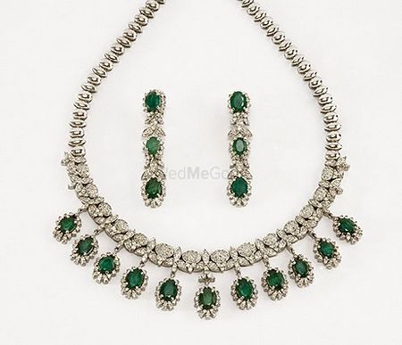 diamond and embellished green necklace and earrings