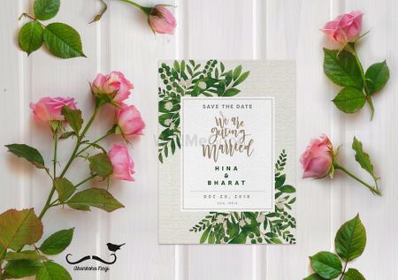 Modern wedding invite with tropical design 
