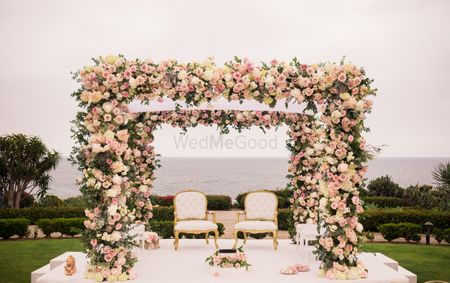 Floral mandap by the sea.