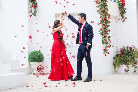 Couple Dancing Pre Wedding Shot with Rose Petal Shower