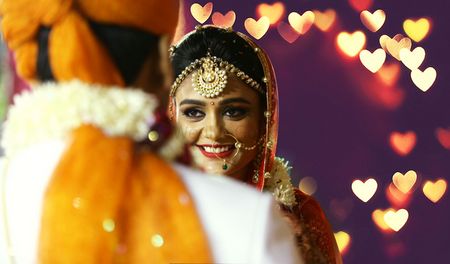 Photo of Smiling Bride Portrait - Gold Mathapatti