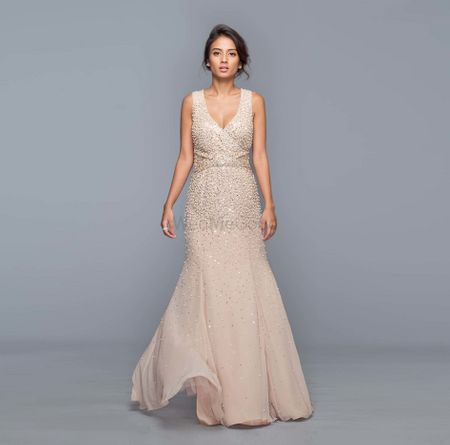 Photo of Shimmery evening beige cocktail gown