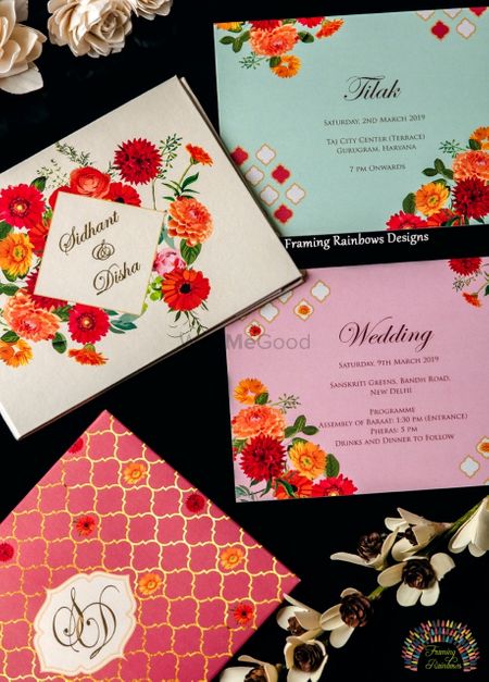 A colorful and kitsch, floral wedding invitation.