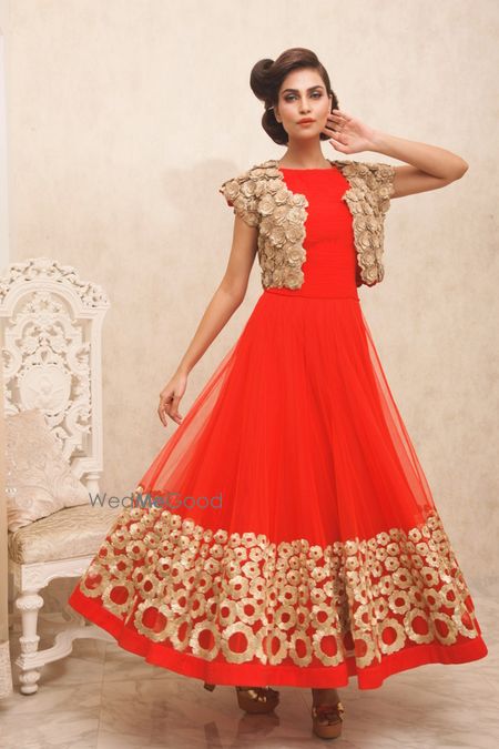 Golden best sale red gown