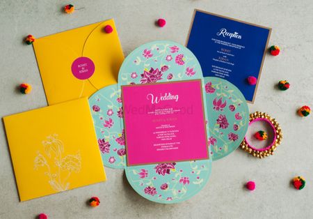Photo of Fun  and colorful wedding invitation card with floral prints