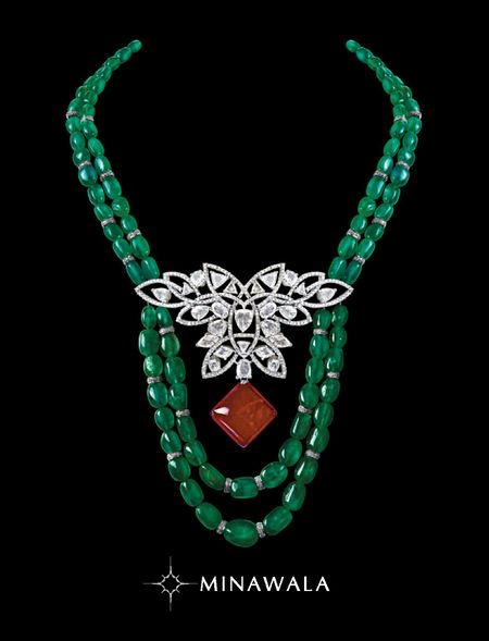 emerald string with diamond brooch