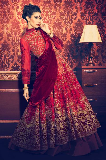 Red and maroon bridal lehenga with full sleeved blouse