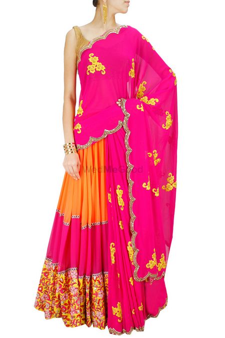 Bright pink and orange lehenga with yellow embroidery