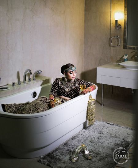 Photo of Bride getting ready shot idea in bathtub with kaleere