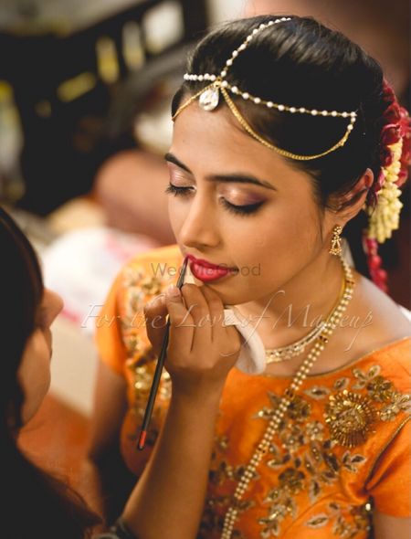 South Indian bridal makeup with nude glossy eyes 
