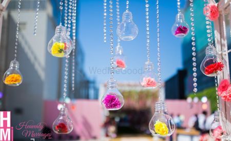 Hanging bulbs with flowers for mehendi 