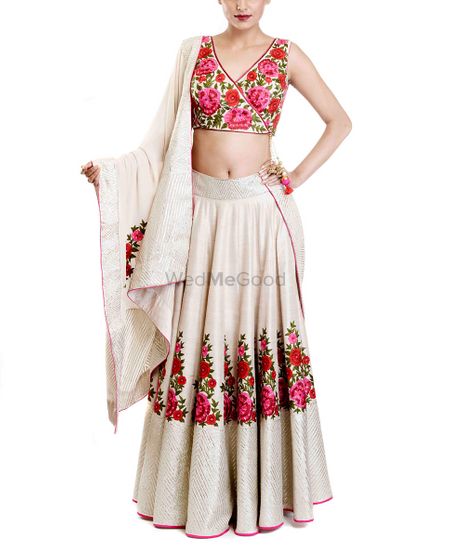 floral print blouse with plain white skirt and floral resham work embroidery