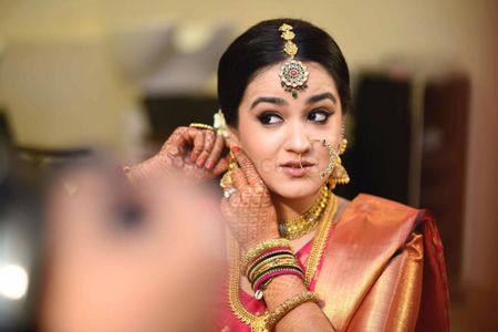 Photo of south indian bride getting ready shot
